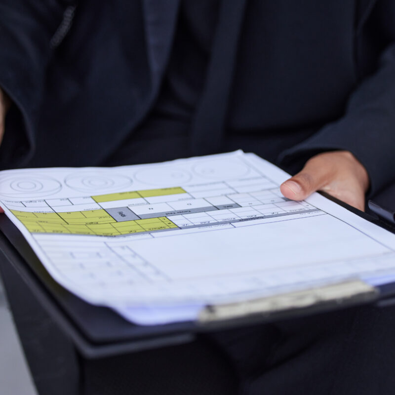 Closeup, woman and clipboard with document, information and survey for data analytics. Zoom, female