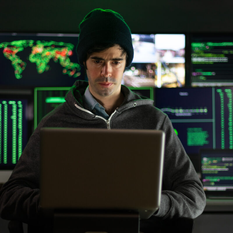 Hacker using laptop breaks into government data servers infects system with virus.